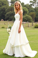 Load image into Gallery viewer, Ivory Satin Spaghetti Straps Sweep Train Boho Wedding Dress with Ruffles