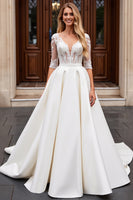 Load image into Gallery viewer, Ivory A Line Satin V Neck Sweep Train Wedding Dress with Lace