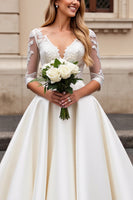 Load image into Gallery viewer, Ivory A Line Satin V Neck Sweep Train Wedding Dress with Lace