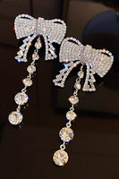 Load image into Gallery viewer, Sparkly Silver Prom Drop Earrings with Bow