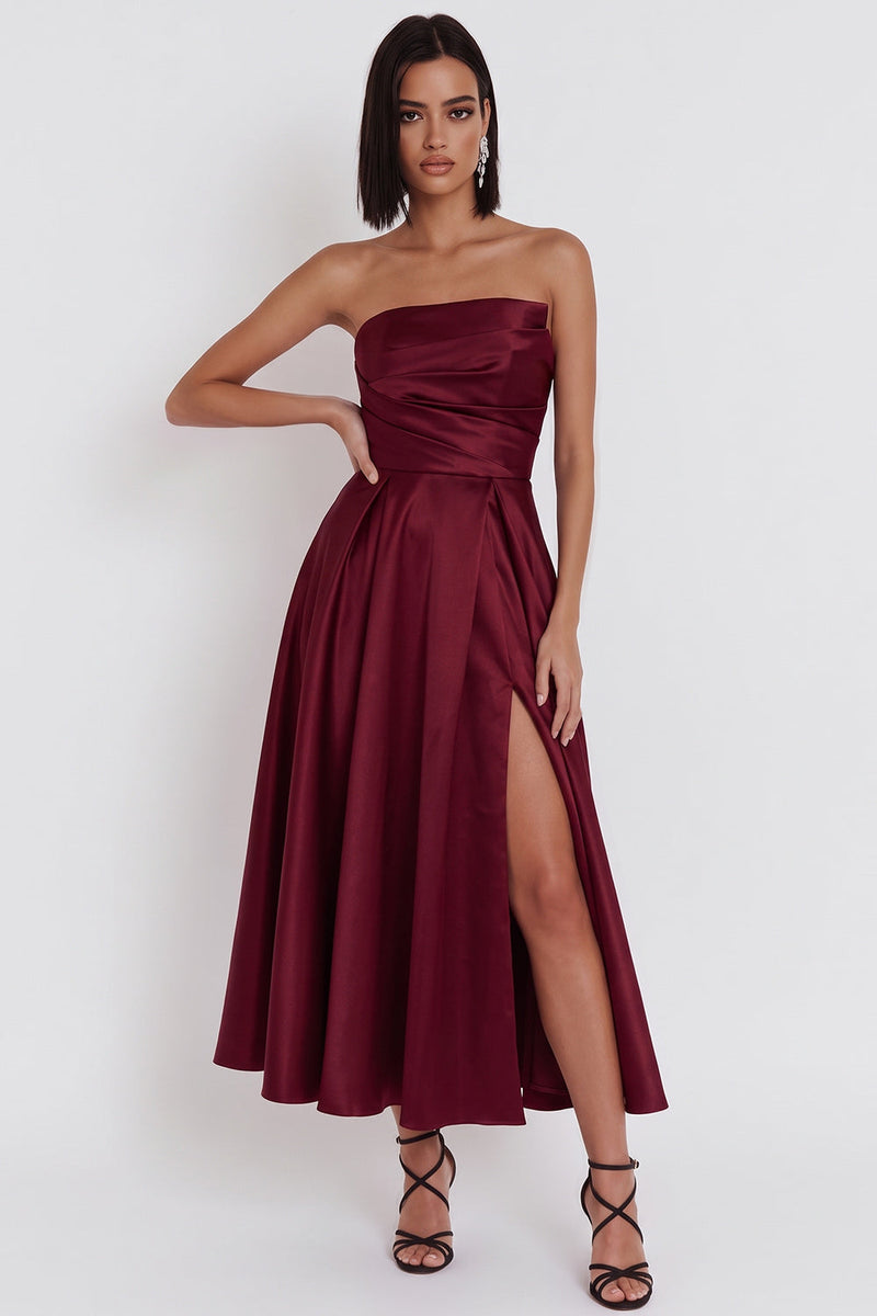 Load image into Gallery viewer, Black Satin Ruched A-Line Strapless Midi Wedding Guest Dress with Slit