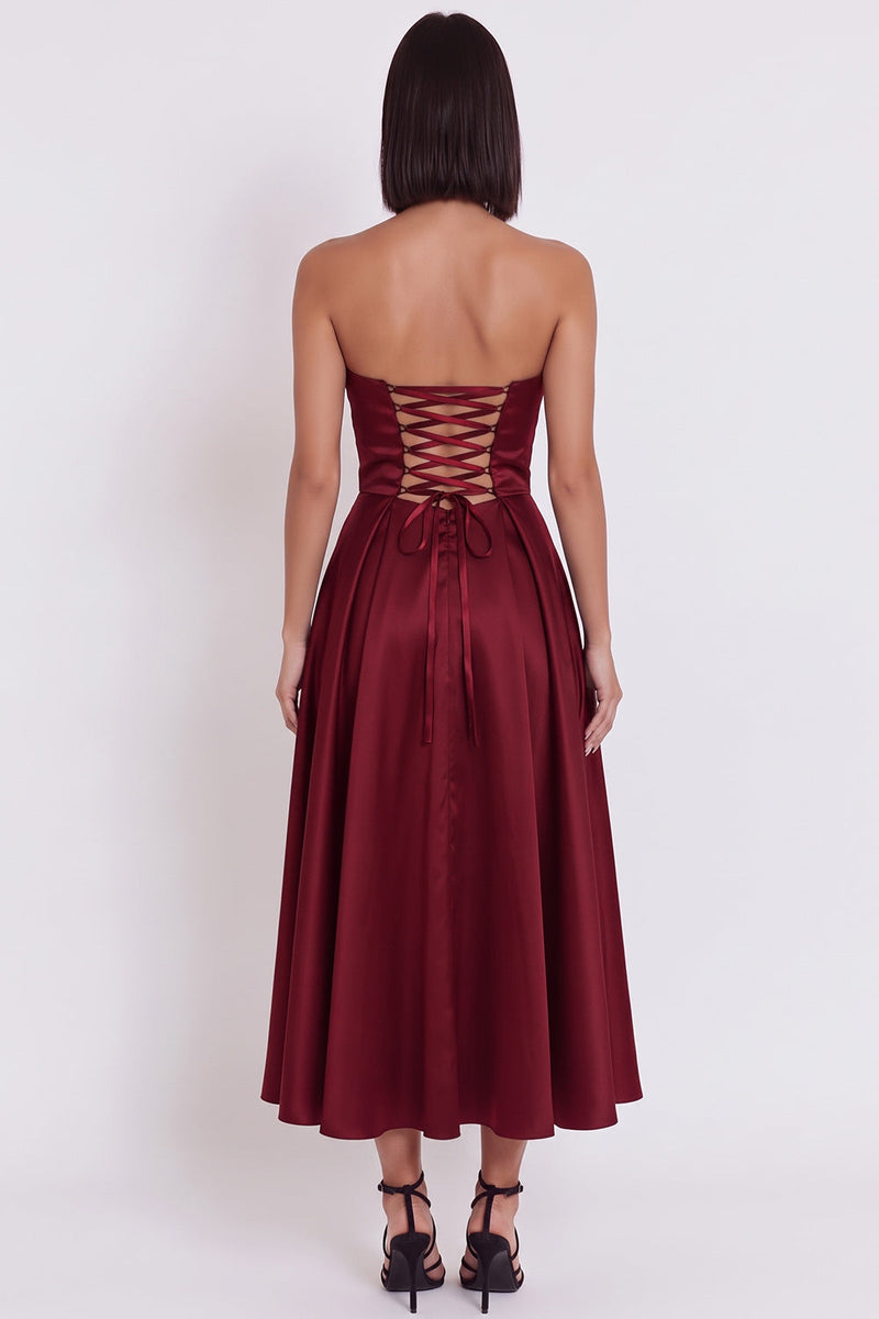 Load image into Gallery viewer, Black Satin Ruched A-Line Strapless Midi Wedding Guest Dress with Slit